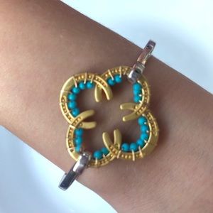 Silver and gold bracelet with turquoise beads